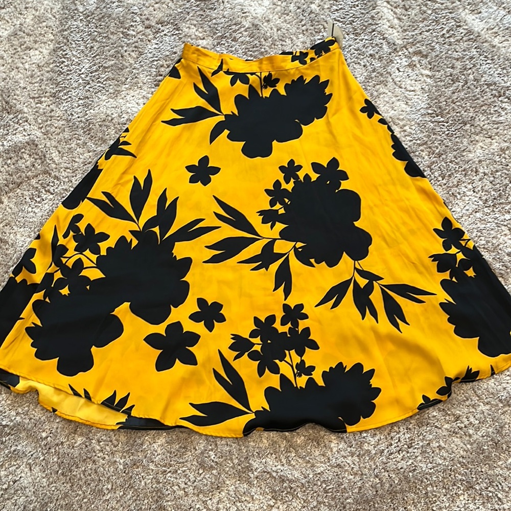 A-line skirt, Size 6 in gold and yellow black floral design.